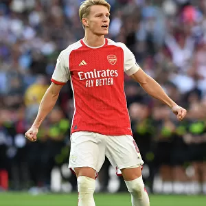 Martin Odegaard Scores the Winning Penalty: Arsenal Claims FA Community Shield over Manchester City