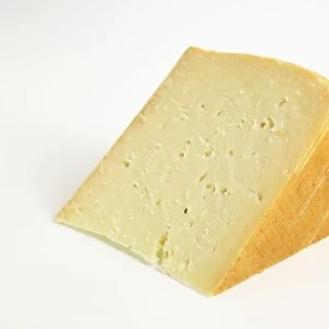 Slice of Spanish Idiazabal ewes milk cheese