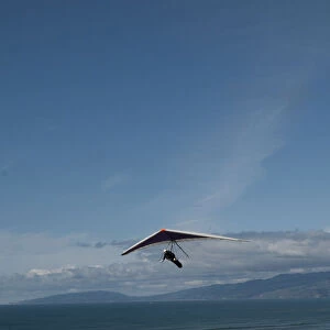 USA, California, San Francisco, Fort Funston, hang glider off the shore