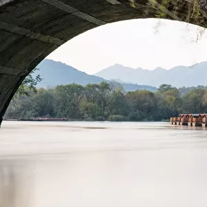 The dock seen from an arch of a stone bridge in Maojiabu Village, Hangzhou, China