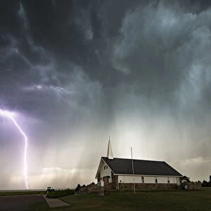 Lightning and Chapel of the Plains, Colorado. USA