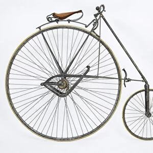 Safety Penny Farthing Model, 1887, Dresden, Germany, side view, drive side. Number of gears - 0 Steel frame / solid rubber tyres Wheel: front 57cm / back 122cm Special features: lever pedals