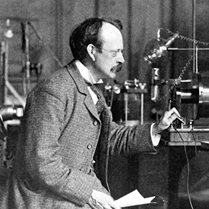 Sir J. J. Thomson with early equipment in the Cavendish Laboratory, Cambridge