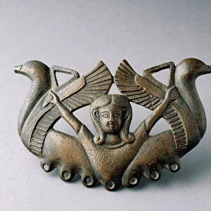 The deity Astarte, surrounded by two birds taking off. 6th century BC ( Bronze sculpture)