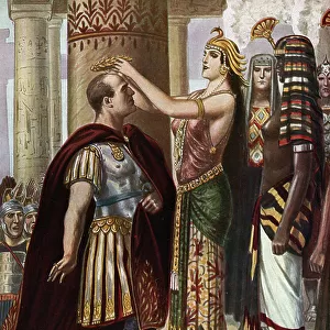 Queen of Egypt Cleopatra VII Thea Philopator (69-30 BC) hands over to Jules Cesar (100-44 BC) the throne of Egypt around 47 BC by placing a crown on her head"