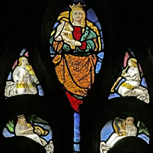 Window depicting Virgin and Child with the Christ child carrying the Cross