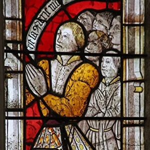 Window w6 depicting a donor and family (stained glass)