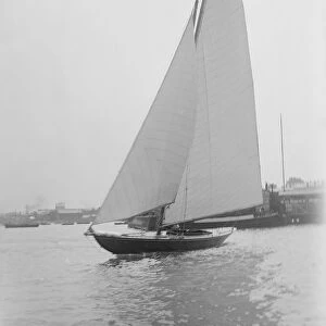 The 7 Metre sailing yacht Pinaster (K8), 1913. Creator: Kirk & Sons of Cowes