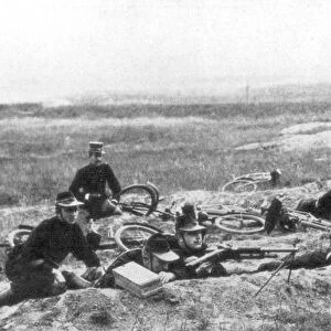 Belgian bicycle troops using Hotchkiss machine guns in Haelen, Belgium, August 1914. Artist: Montigny