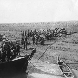 British troops unloading dates on the shore of the Tigris river, 1918