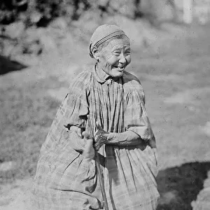 Butter churning, 1890. Creator: Unknown