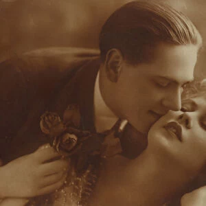 Postcard of romantic vintage couple, in sepia