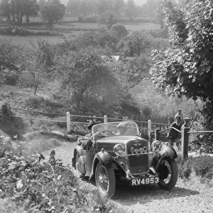 Singer open 2-seater taking part in a West Hants Light Car Club Trial, Ibberton Hill, Dorset, 1930s