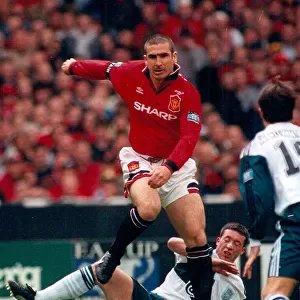 Eric Cantona in action for Man United