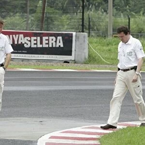 2008 GP2 Asia Series. Friday Preview. Round 2 - Sentul International Circuit, Indonesia. Friday 15th February. Marco Codello (Director of Operations) and Didier Perrin, (Technical Director) walk the track