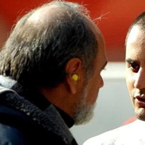 Formula One Testing: Juan Pablo Montoya McLaren Mercedes chats with his father Pablo Montoya