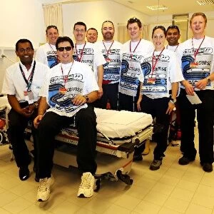 Formula One World Championship: The Chief Medical Officer of the Medical Centre with a selection of his team
