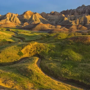 The area called yellow mounds lit by the sunset in badlands national park; south dakota united states of america