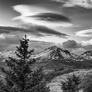 Black And White Photo Of Lenticular Clouds Over The Three Sisters Mountains, Kodiak Island, Southwest Alaska
