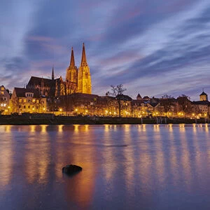 Danube River and St Peters Cathedral in the Old Town of Regensburg at dusk, Bavaria, Germany