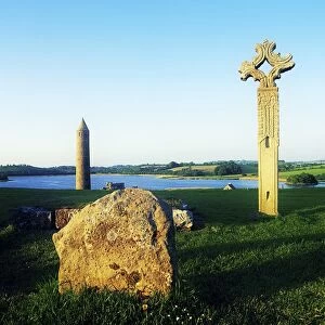 Devenish Island, Co Fermanagh, Ireland; High Cross And 12Th Century Round Tower In The Distance
