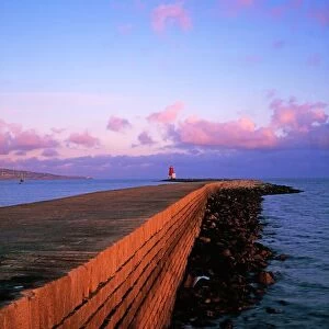Dublin Bay, Co Dublin, Ireland; East Wall With Lighthouse At The End