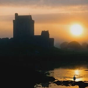 Dunguaire Castle, Kinvara, Co Galway, Ireland; Silhouette Of A 16Th Century Castle At Sunset