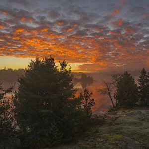 Glowing Clouds At Sunrise; Ontario, Canada