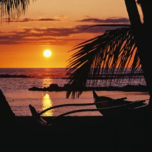Hawaii, Big Island, Mauna Lani Beach Hotel, Ocean Sunset, Outrigger Canoe Resting On A Tropical Beach