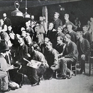 Henri Toulouse-Lautrec, 1864 - 1901, French Post-Impressionist artist, at the Atelier Cormon where he studied under the owner, Fernand Cormon, 1845 - 1924. Cormon is seated at the easel. Lautrec is seated at the left foreground. Other students who studied under Cormon include Emile Bernard and Vincent van Gogh. After a work by an unidentified photographer