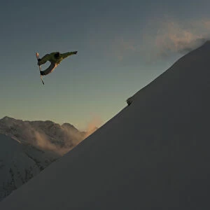 Professional Snowboarder, Frederik Kalbermatten, Extreme Snowboarding At Sunset, Arlberg, Austria