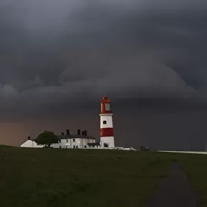 Souter Lighthouse Under Ominous Storm Clouds; South Shields, Tyne And Wear, England