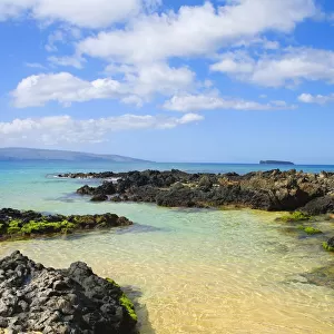 USA, Hawaii Islands, Maui, Shallow Ocean Water Surrounded By Rocks And Sand; Makena, Maui Wai Or Secret Beach