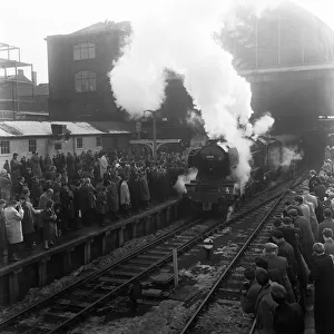 The 1. 15 to Doncaster, pulled by The Flying Scotsman, gets a hearty send off from 300