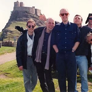 The 1996 line-up of the pop group Lindisfarne, pictured here on Holy Island (Lindisfarne)