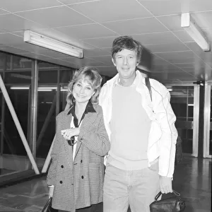 Actress Felicity Kendal at Heathrow February 1985, with her husband Michael Rudman