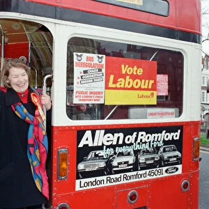 Actress Glenda Jackson standing at the back of a double decker bus