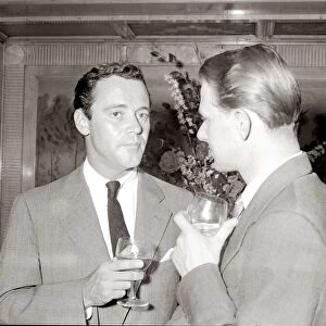 American actor Jack Lemmon drinking a glass of wine during a during a press reception at