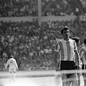 Argentinian players argue with Rudolph Kreitlin 1966 referee during quarter