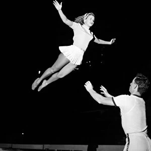 Beverley Ferris and husband acrobats performing with the Globe Trotters Basketball team