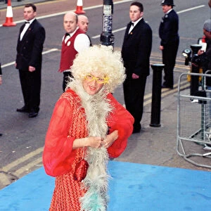 Brian May arriving at Elton Johns 50th birthday party at Hammersmith Palais