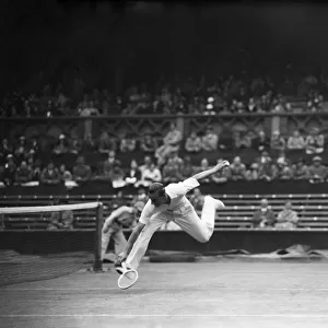 Fred Perry competing at Wimbledon Centre Court in the The 1933 International Lawn Tennis