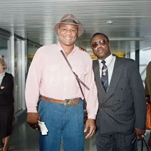 George Foreman and Joe Frazier at London Airport. 16th October 1989