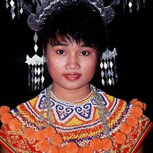 Iban Tribal Girl in traditional costume, Sarawak East Malaysia (Borneo) circa 1995