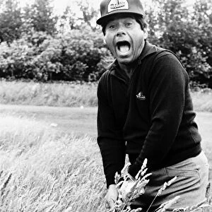 Lee Trevino with an open mouthed look of shock which conveys his feelings about
