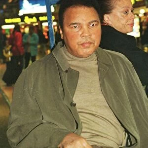Muhammad Ali boxing legend December 1999 leaves Heathrow Airport for the United