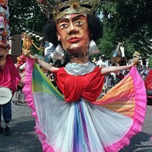 Notting Hill Carnival August 1991 Men and women dress up in costumes during