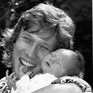 Peter Duncan TV Presenter who was on the Childrens TV Programme Blue Peter holding his