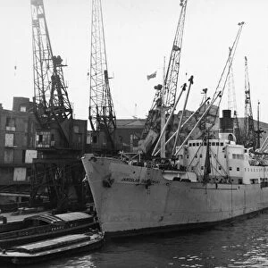 The Polish Steamer Jaroslaw Dabrowski seen here unloading her cargo in the Pool of London