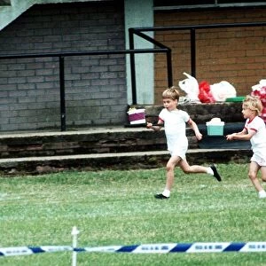 Prince William finishes first in the relay race at his Sports Day event